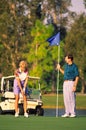 Couple Golfing 1 Royalty Free Stock Photo