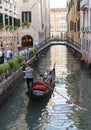 A couple in a gondola in Venice, Italy