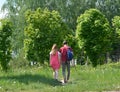 Couple walk green summer landscape in the Minsk city Belarus