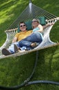 Couple in hammock laughing