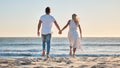 Couple, hand holding and vacation at beach, love and trust together with travel and adventure with nature and ocean view Royalty Free Stock Photo