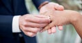 Couple, hands and ring for marriage, love or wedding in ceremony, commitment or support together. Closeup of people Royalty Free Stock Photo