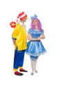 Couple of happy clowns in Pinocchio and Malvina suits