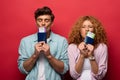 Couple of happy travelers kissing passports with air tickets, Royalty Free Stock Photo