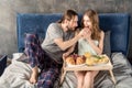 Couple has breakfast in bed Royalty Free Stock Photo