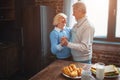 This couple has a splendid time dancing in the kitchen and remem Royalty Free Stock Photo