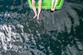 Couple haveing relaxon pedalo on clear lake Royalty Free Stock Photo