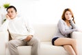 Couple having argument on the couch in the living room Royalty Free Stock Photo
