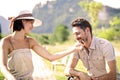 Couple having a bicycles ride into the nature