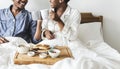 A couple having breakfast in bed Royalty Free Stock Photo