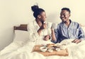 A couple having breakfast in bed Royalty Free Stock Photo