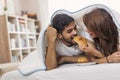 Couple having breakfast in bed Royalty Free Stock Photo