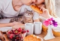 Couple having breakfast in bed Royalty Free Stock Photo