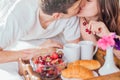 Couple having breakfast in bed Royalty Free Stock Photo