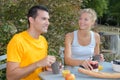 Couple having breakfast outdoors Royalty Free Stock Photo