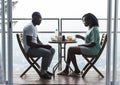 Couple having breakfast together at the balcony Royalty Free Stock Photo