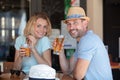 couple having drink on pub terrace Royalty Free Stock Photo