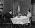 Couple having formal dinner at home Royalty Free Stock Photo