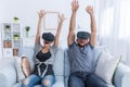 Couple having fun with 3D roller coaster