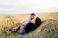 Couple having fun in a field Royalty Free Stock Photo