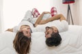 Couple having fun lying in bed Royalty Free Stock Photo