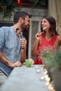 A couple having fun at the open air birthday party. Quality friendship time together Royalty Free Stock Photo
