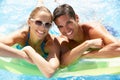 Couple Having Fun In Swimming Pool Royalty Free Stock Photo