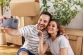 Couple having fun taking selfies with their new apartment keys Royalty Free Stock Photo