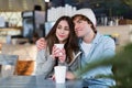 Couple having hot drink on winter day