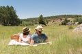 Couple having a picnic in the countryside of Spain.