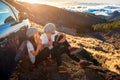 Couple having picnic near the car Royalty Free Stock Photo