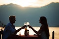 Couple is having a private event dinner on a tropical beach during sunset time Royalty Free Stock Photo