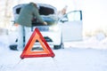 Couple having problem with the car during winter trip Royalty Free Stock Photo