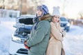 Couple having problem with the car during winter trip Royalty Free Stock Photo