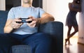 Couple having problem with video games. Girlfriend jealous of technology. Distant marriage, divorce. Unhappy lonely wife.