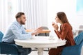 Couple having quarrel in cafe. Relationship problems Royalty Free Stock Photo