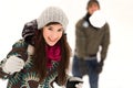 Couple having snowball fight