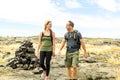 Couple at the Hawaii Volcano National Park, Pu u Loa petroglyphs, amazing walk into the past. Royalty Free Stock Photo