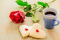 Couple of heart shape white bread with coffee cup and red rose. Royalty Free Stock Photo