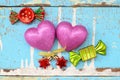 Couple hearts and with accessory on wooden board