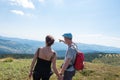 Couple on hike looking at the landscape