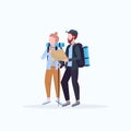 Couple hikers with backpacks holding travel map man woman planning the route hiking concept travelers on hike full
