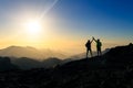 Couple hikers celebrating success concept in mountains Royalty Free Stock Photo