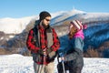 Couple of hikers exploring snowy mountain