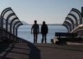 A couple of hikers looking at Bellingham Bay at the entry to South Bay trail near Boulevard Park