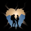 Couple of hikers in a mountain cave in a shape of heart