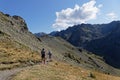 Couple of hikers on the paths of Chamrousse resort Royalty Free Stock Photo