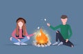 Couple hikers roasting marshmallow candies on campfire hiking camping concept man woman travelers on hike horizontal