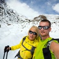 Couple hikers selfie portrait expedition in winter mountains Royalty Free Stock Photo