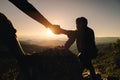 Couple hiking help each other, Rock Climbing, Mountain Climbing, Hiking Royalty Free Stock Photo